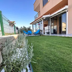 https://capo-calaberno-aparts.aegeanhotels.net